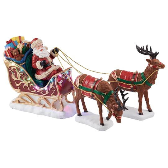 Moments in Time 9.5" Santa Riding Sleigh with Reindeers Décor
